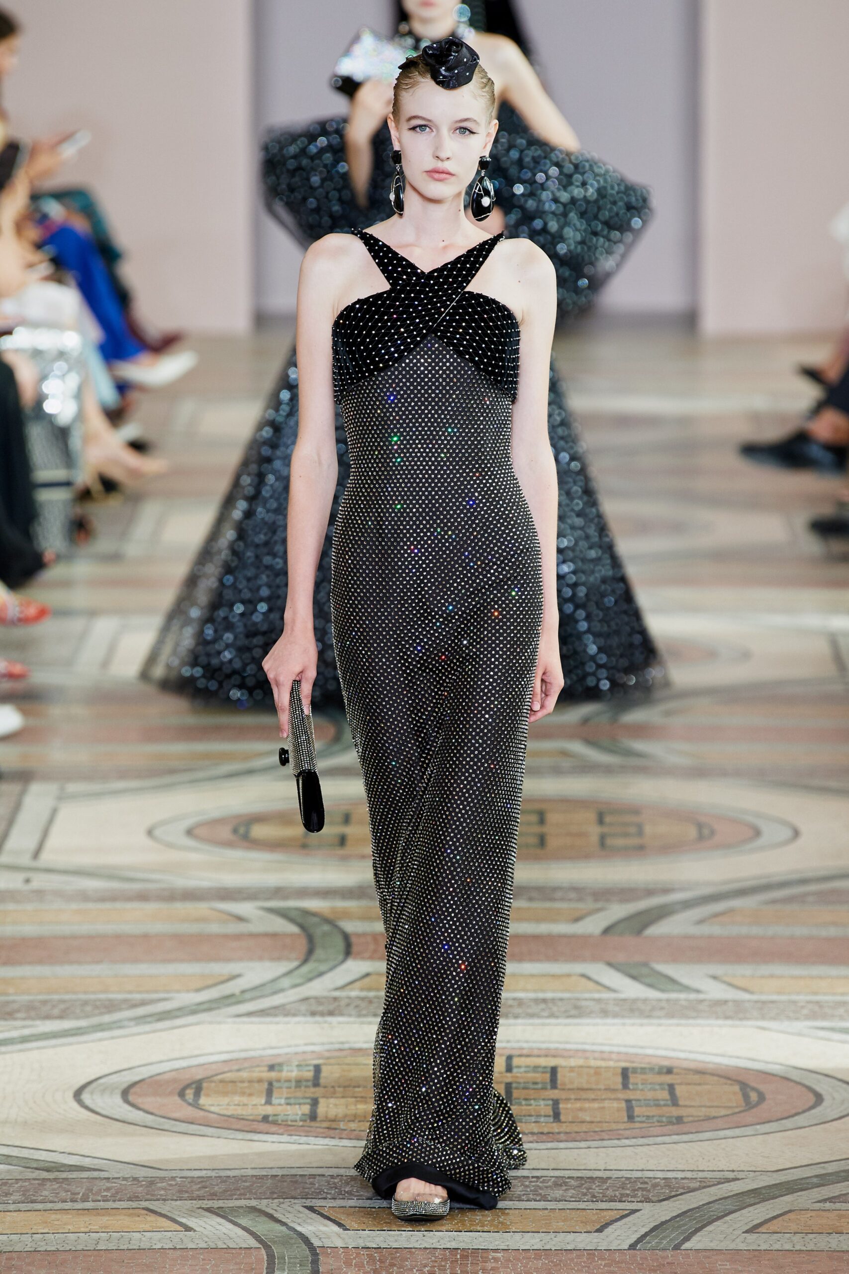 black sequined sleeveless gown
