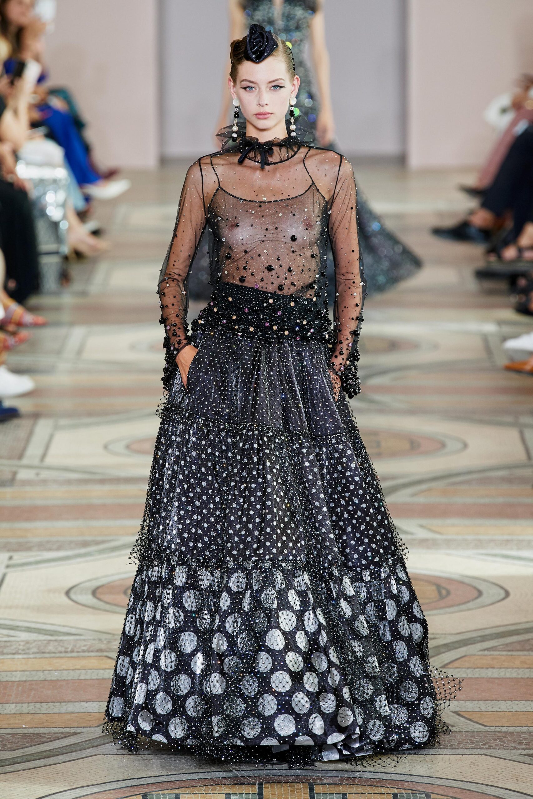 black sheer top and tiered skirt
