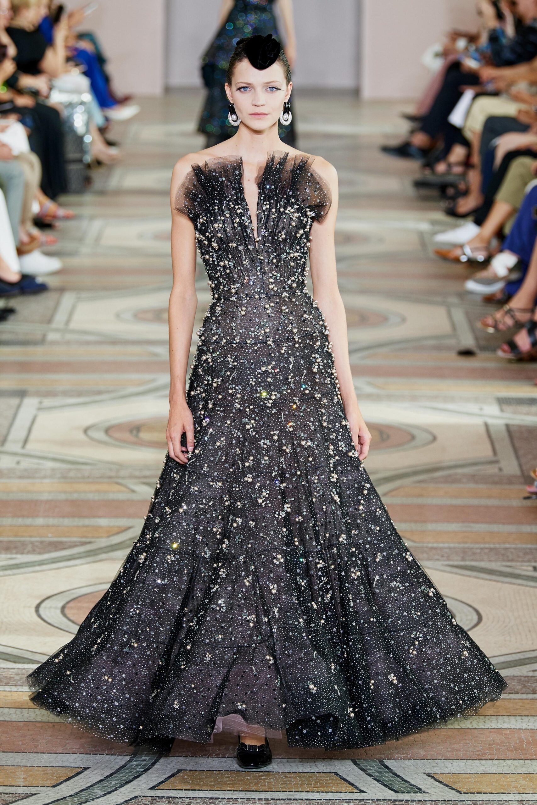 black embellished sleeveless gown