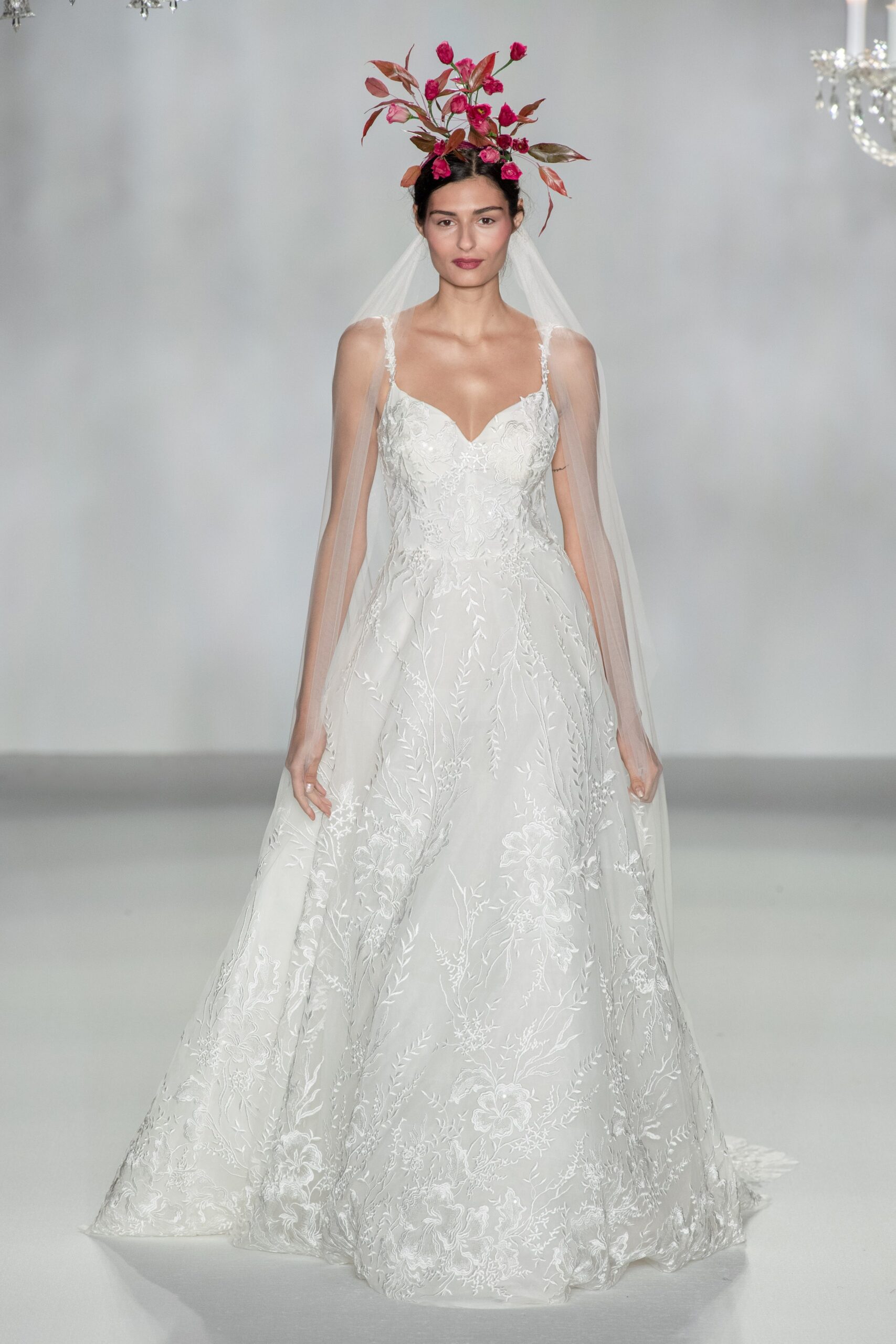 white embroidered sleeveless gown