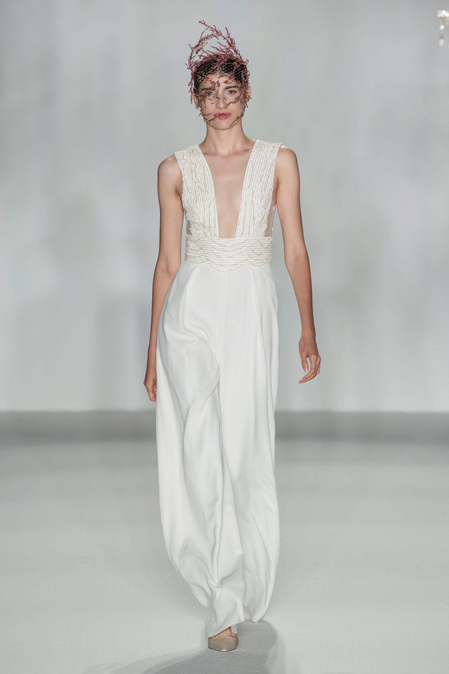 white silk sleeveless jumpsuit