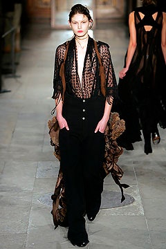 black silk blouse and tailored pants