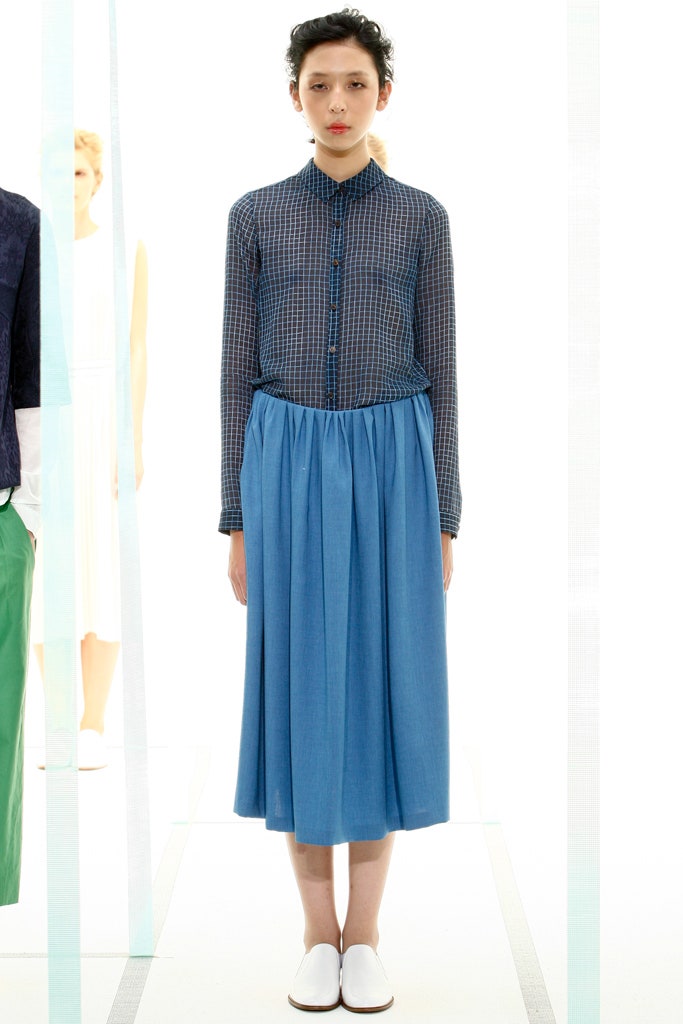 blue checked shirt and pleated skirt