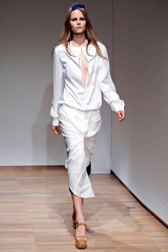 white silk fitted blouse and skirt