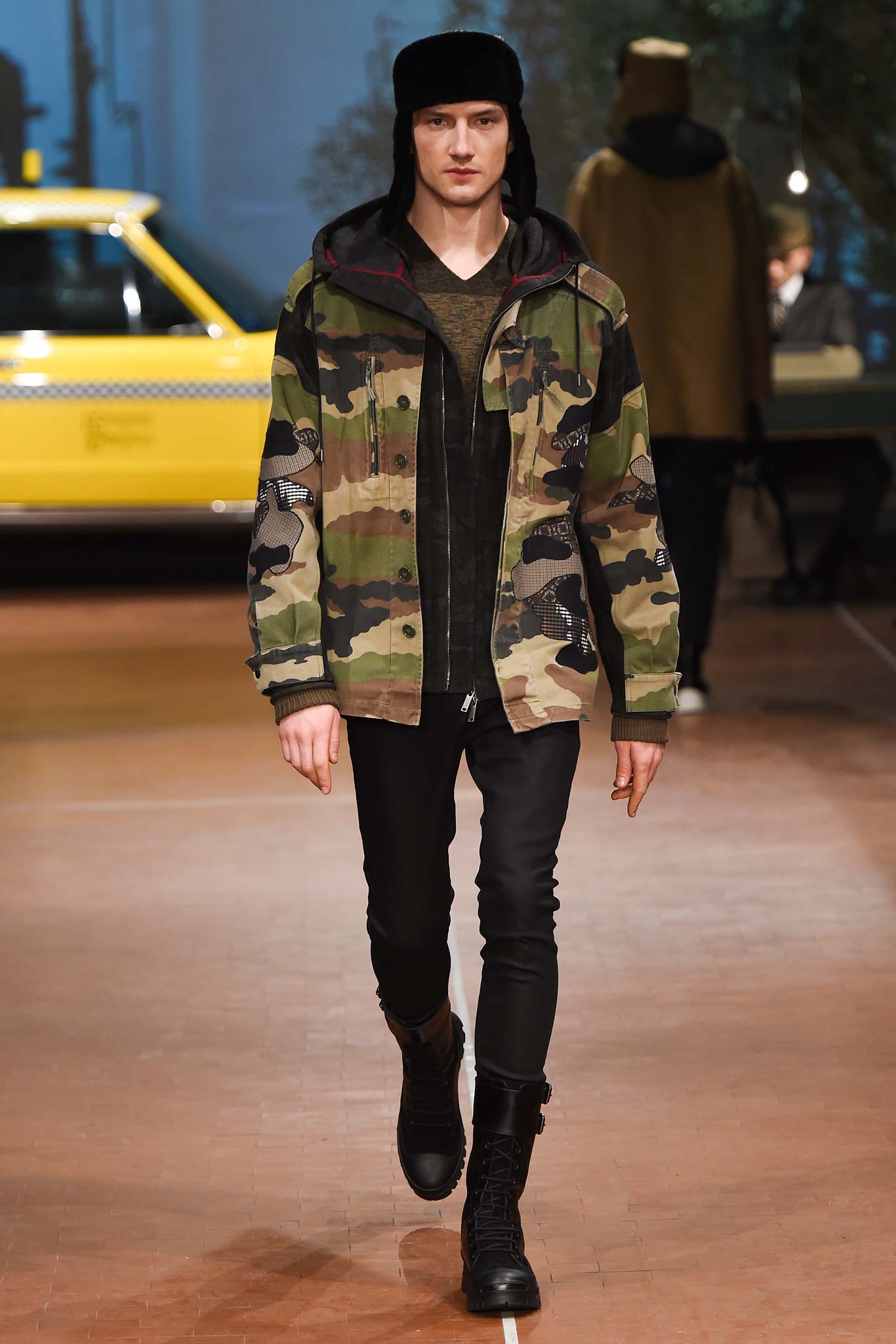 camouflage jacket with black t-shirt and pants