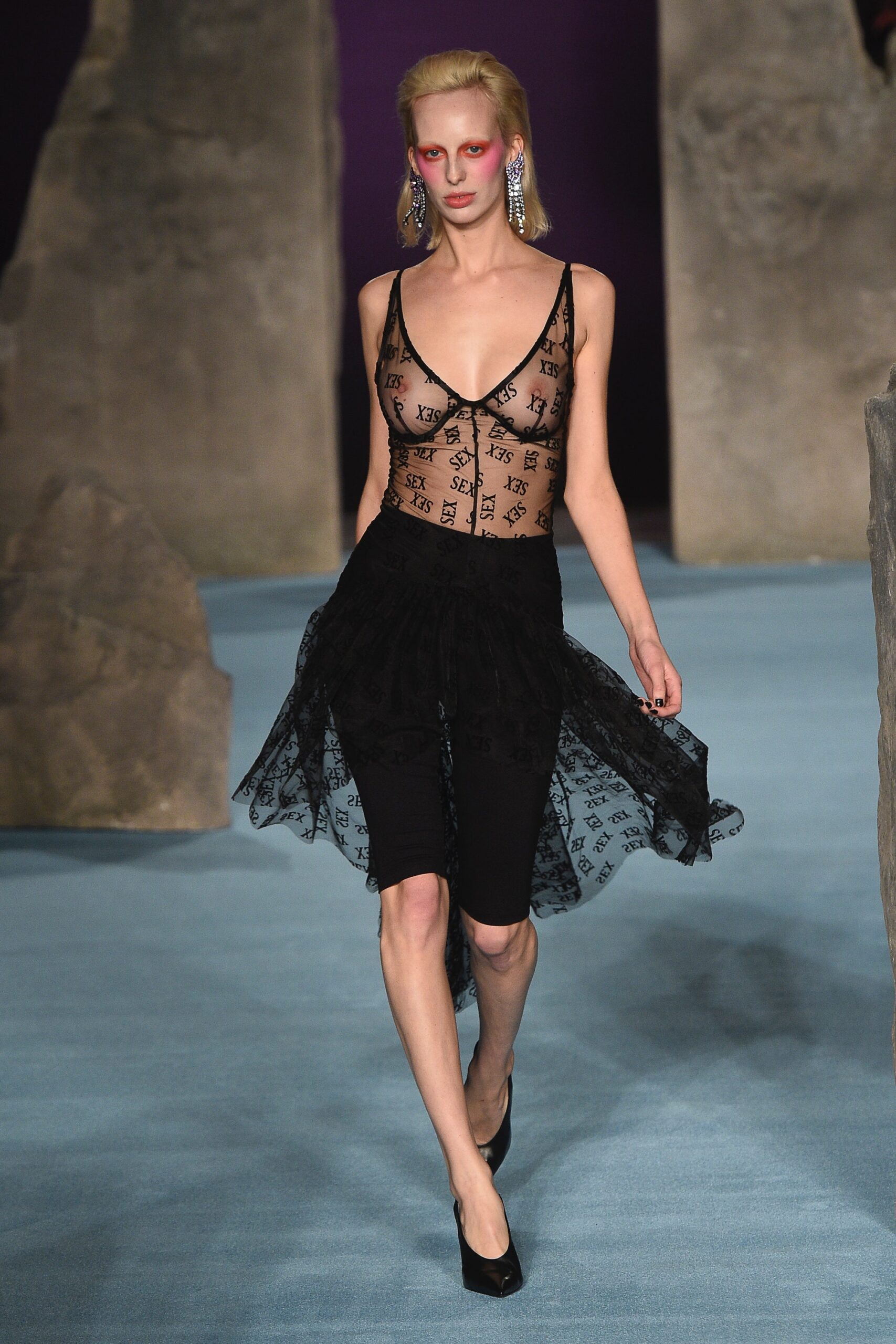 black lace top and fitted pants
