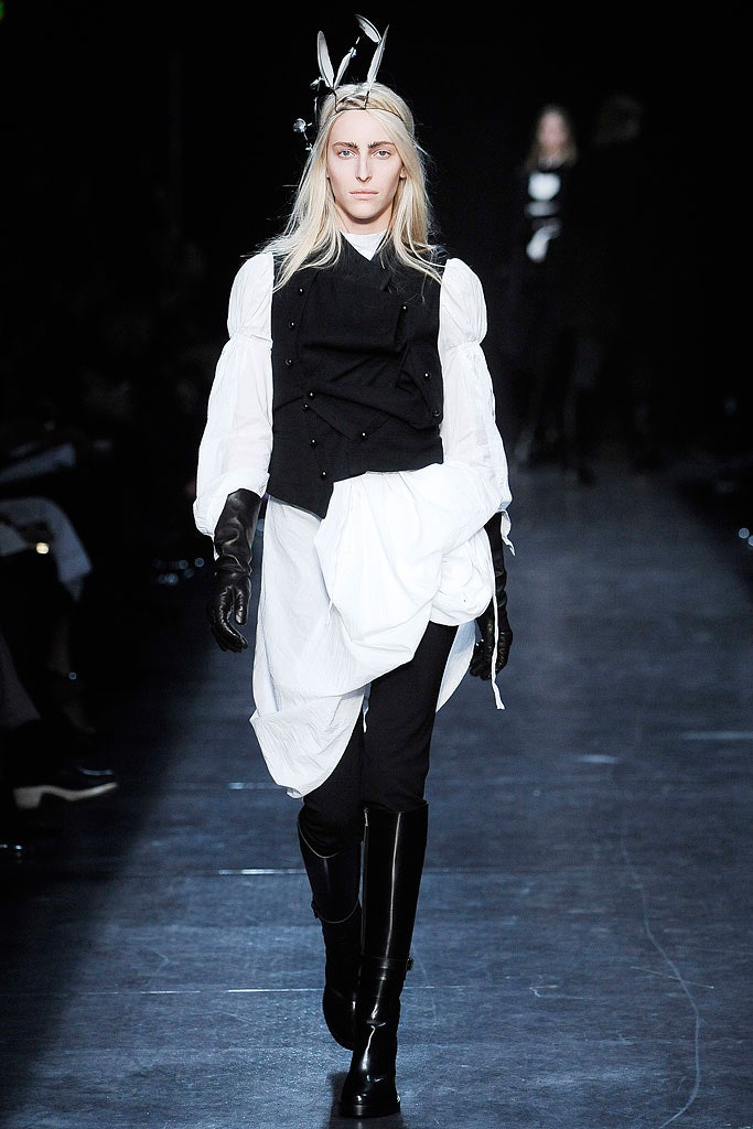 black vest and white blouse