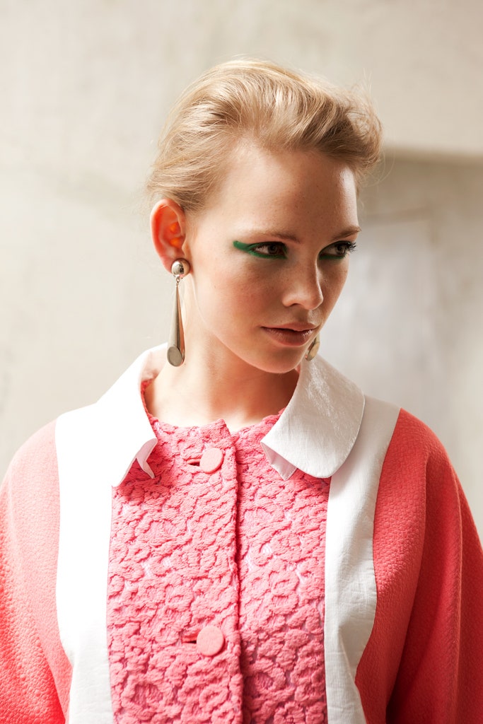 pink and white fitted blouse