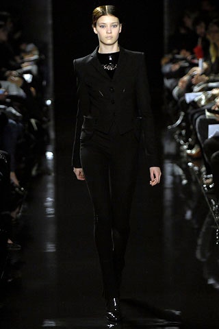 black fitted suit with straight-leg pants