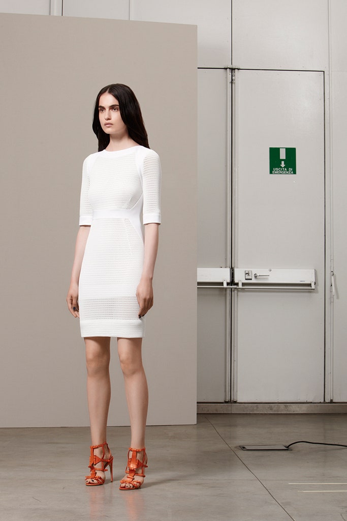 white fitted mini dress with orange shoes