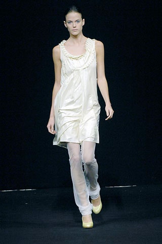 white silk relaxed dress with yellow shoes