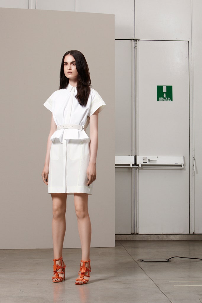 white fitted dress with orange shoes