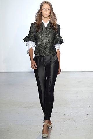 fitted black leather jacket and pants