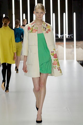white embroidered coat and green dress