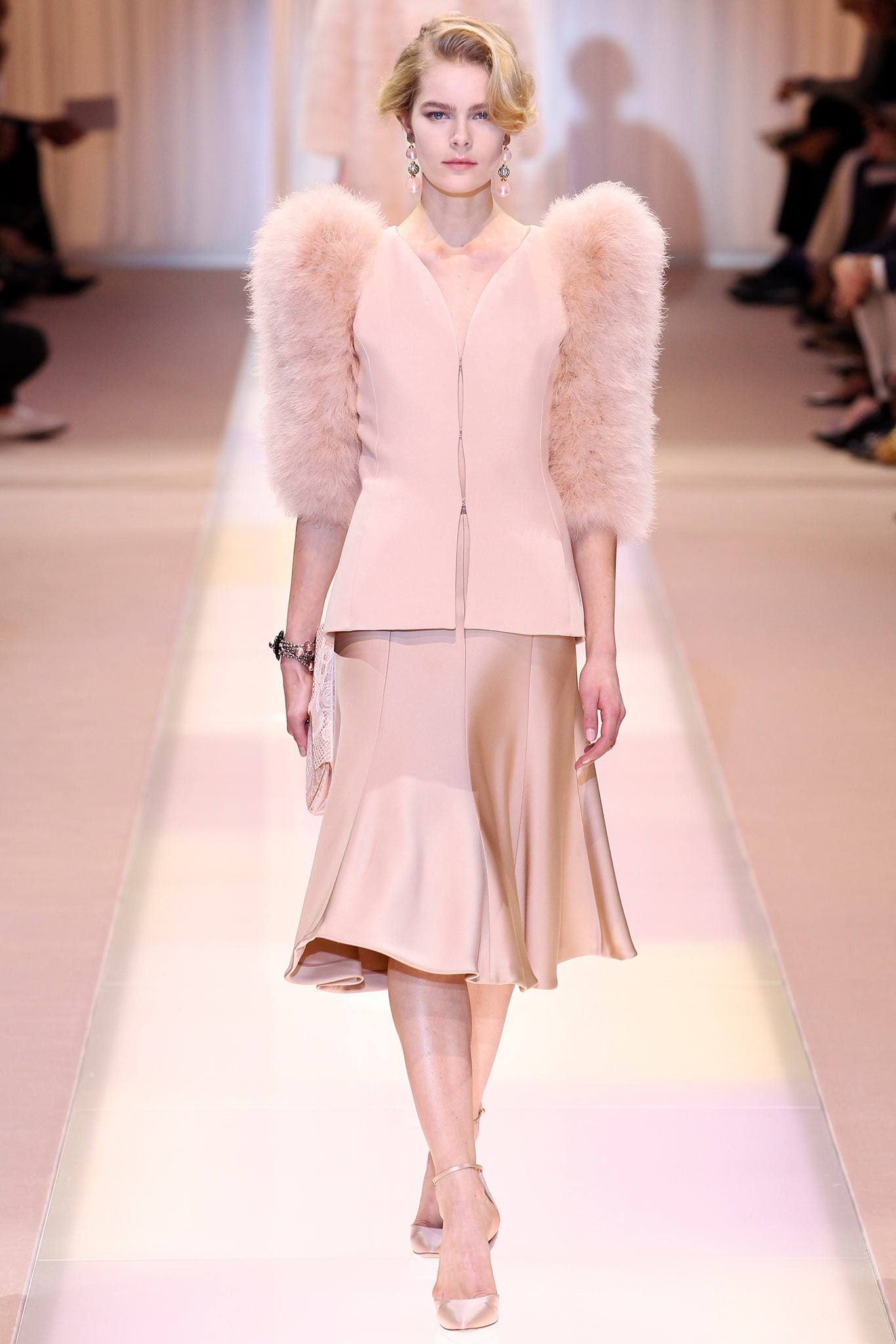 pink silk fitted blouse and beige a-line skirt