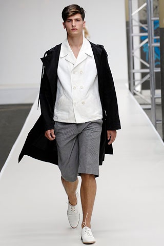 black coat white jacket gray shorts