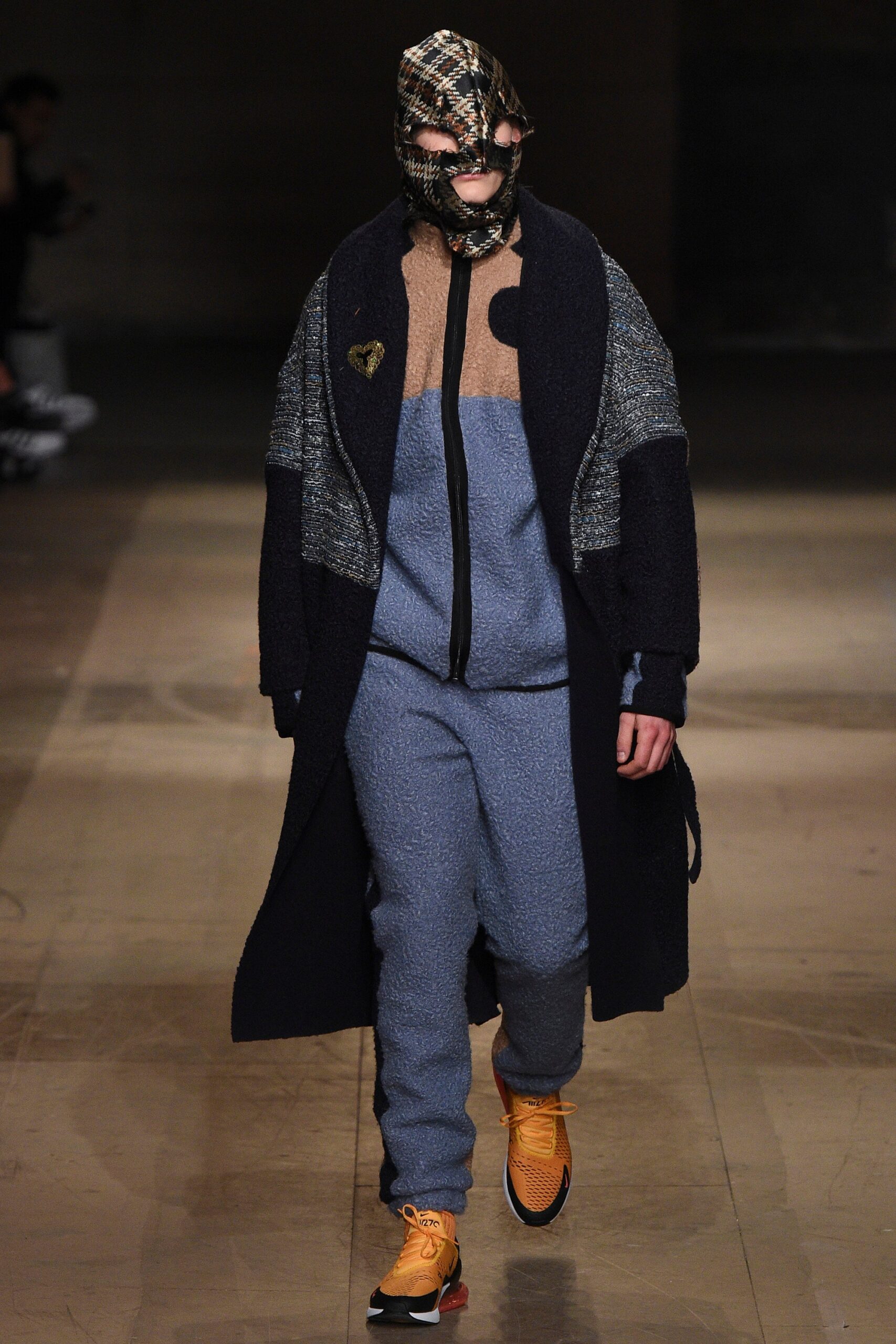 black wool coat with jumpsuit