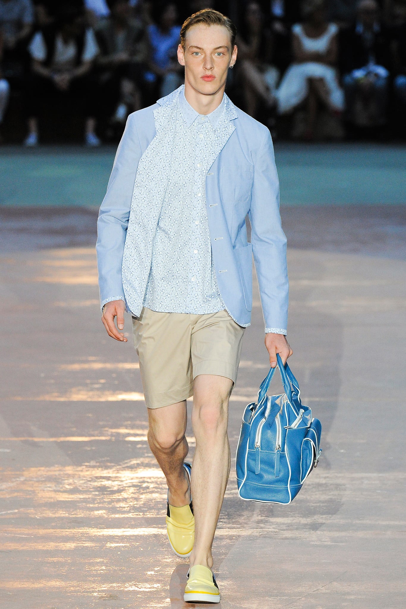 blue jacket with beige shorts