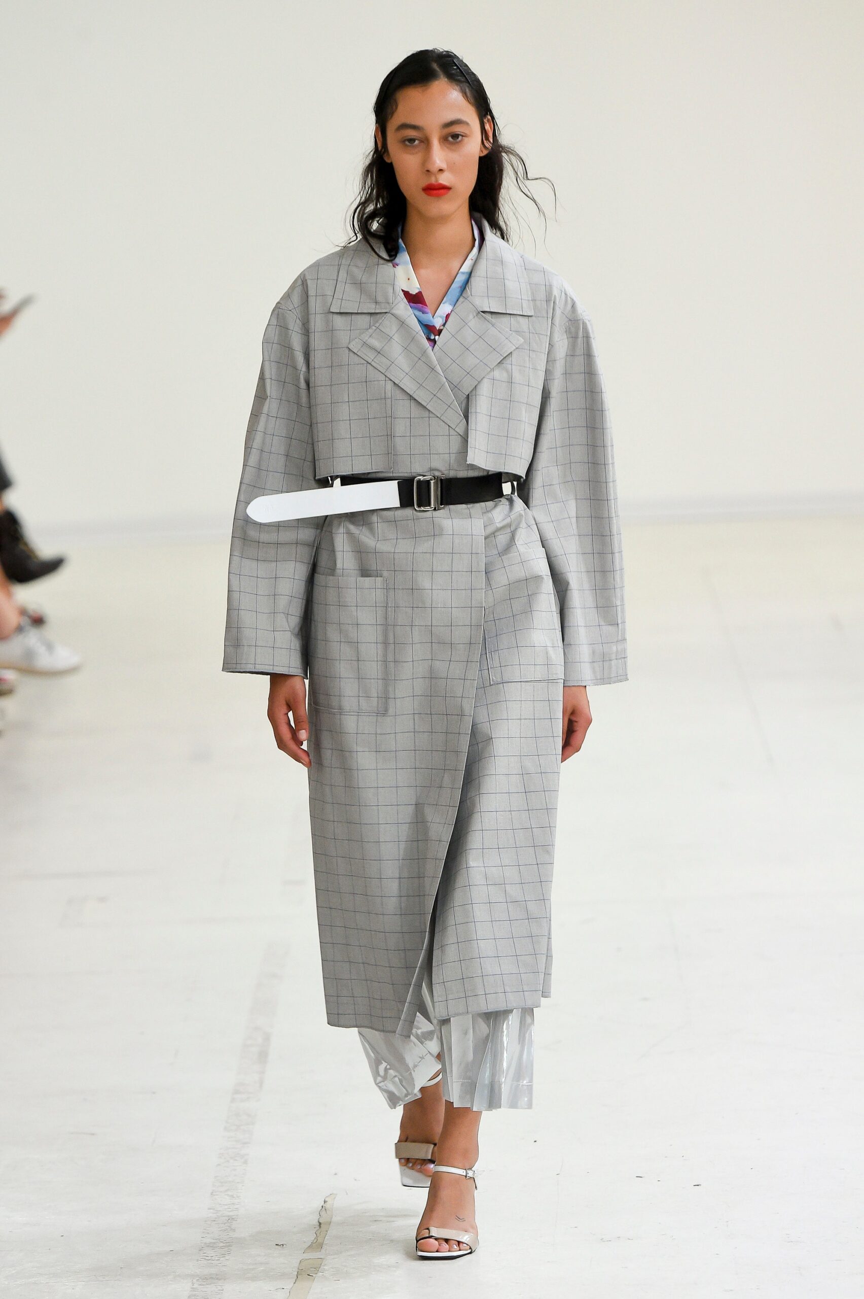 gray checked coat with white pants