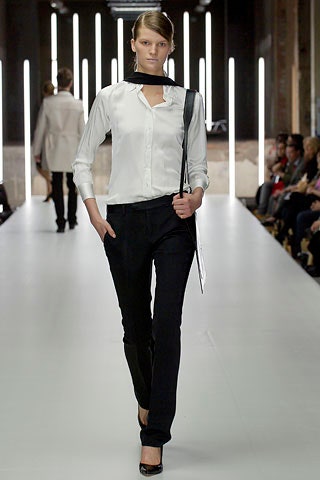 white fitted shirt and black tailored pants