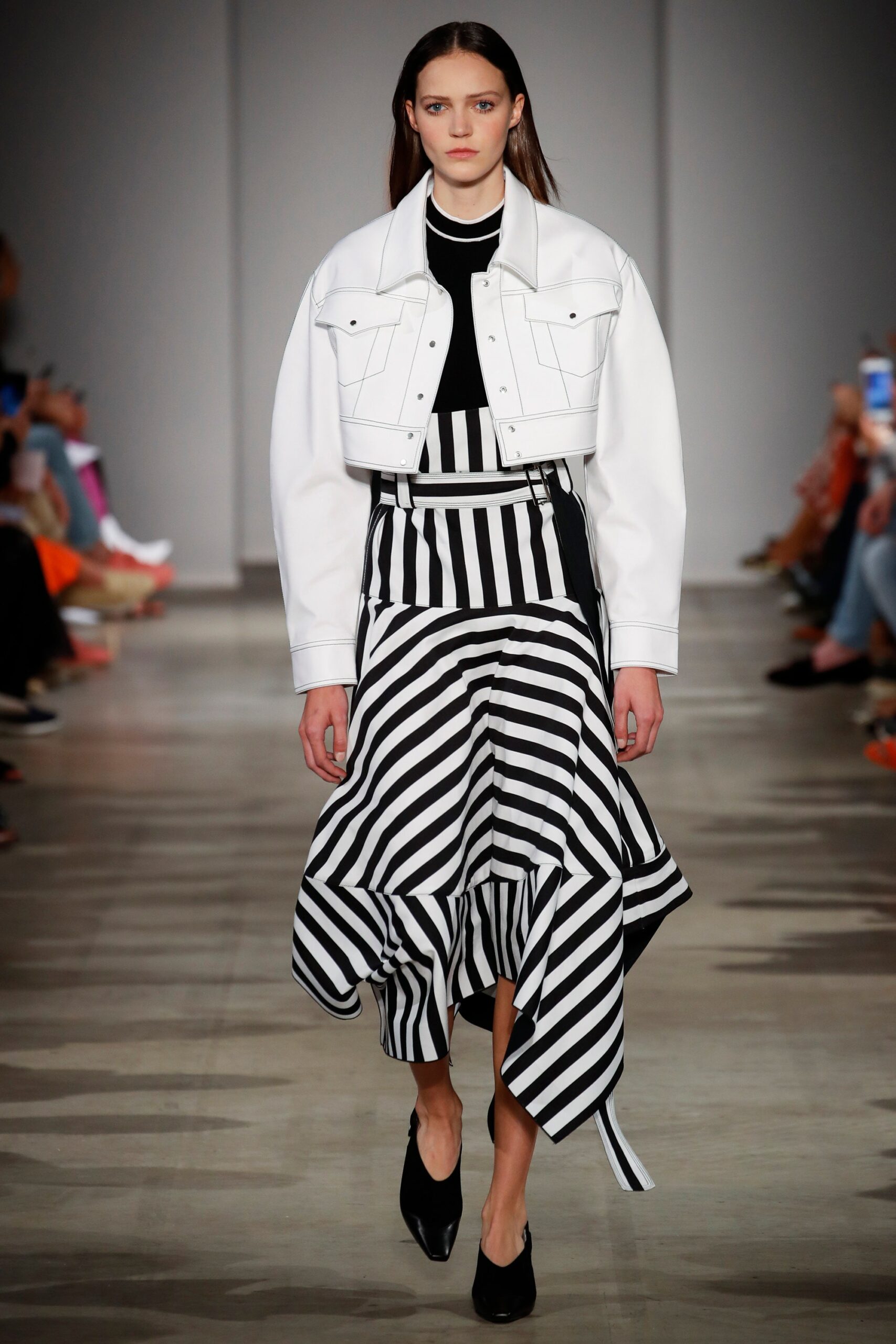 oversized white denim jacket and striped midi dress