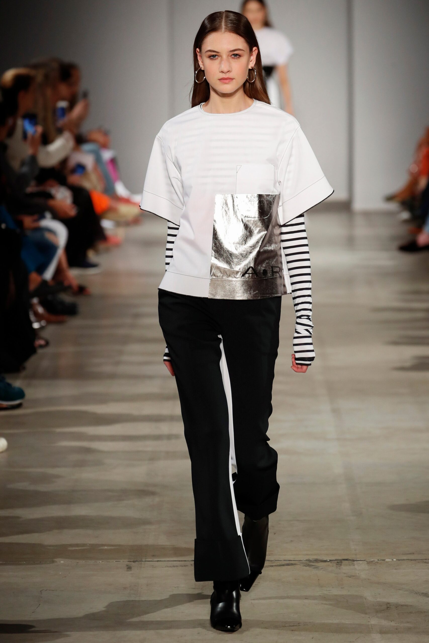 relaxed white top with black pants