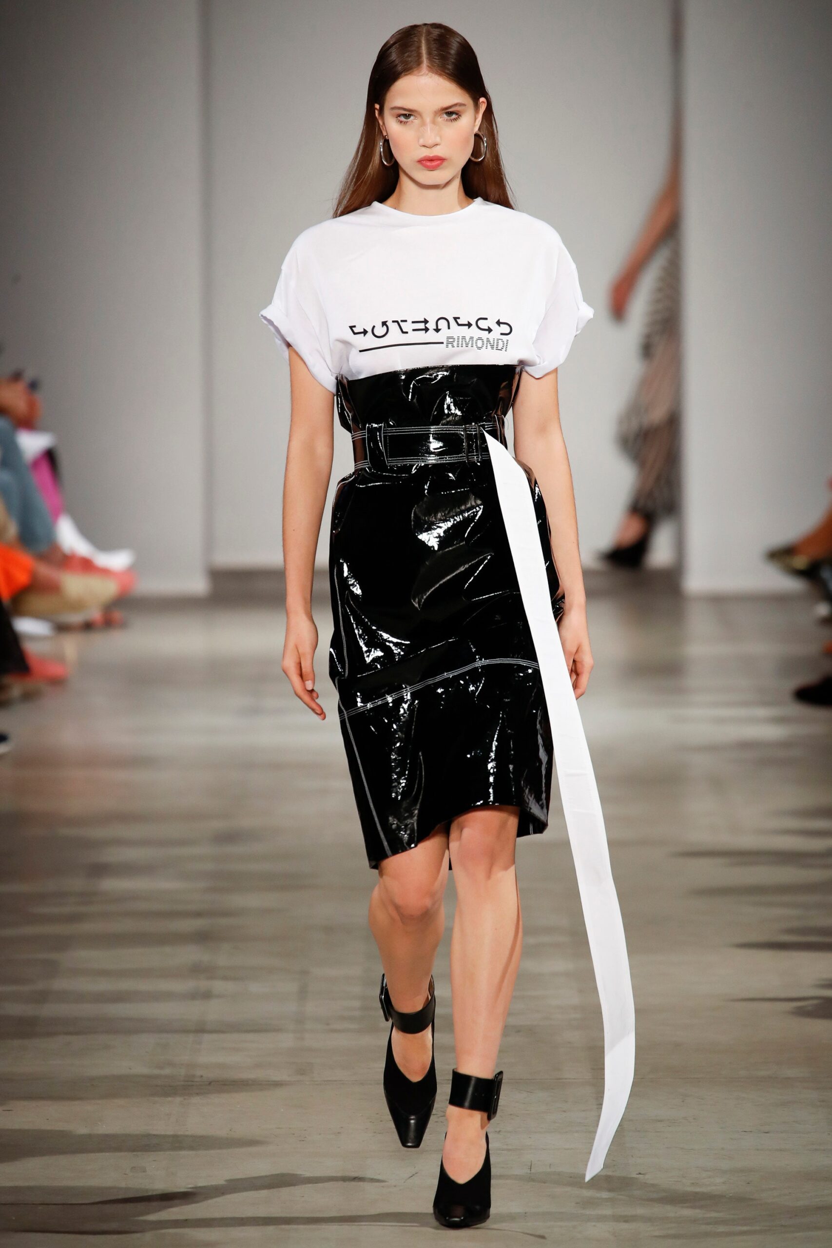 black vinyl fitted midi dress and white t-shirt