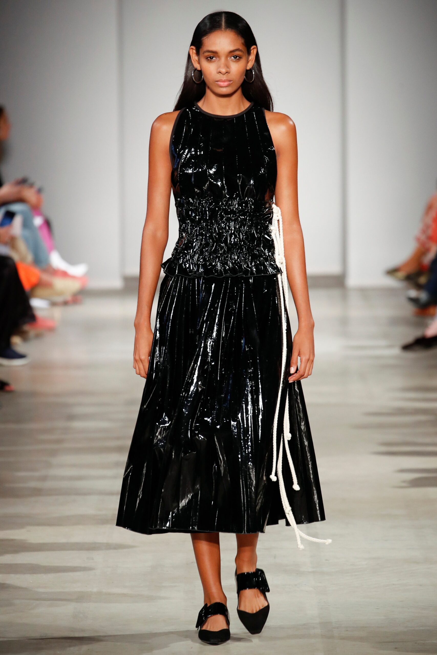 black vinyl sleeveless dress