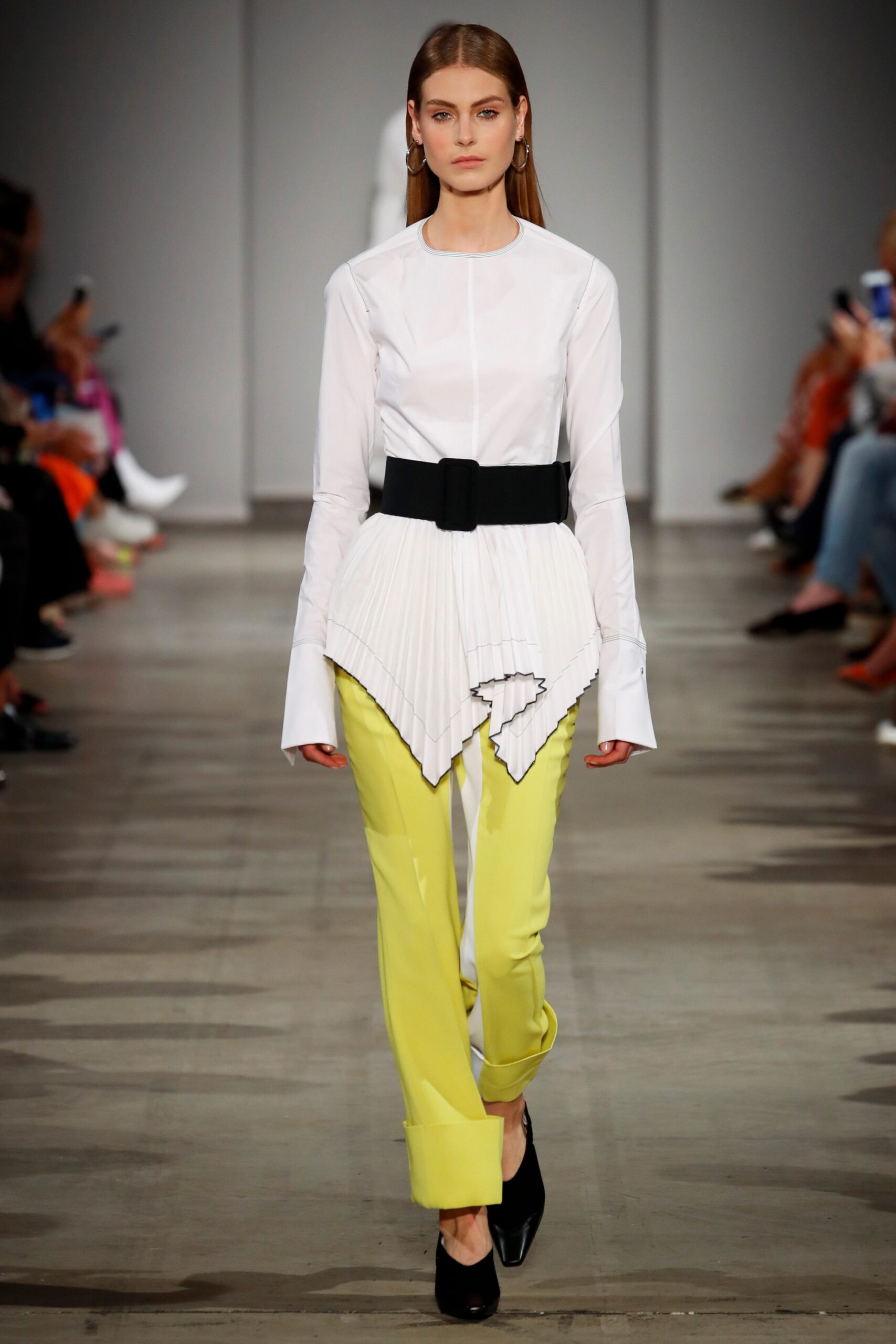 white fitted shirt with yellow tailored pants