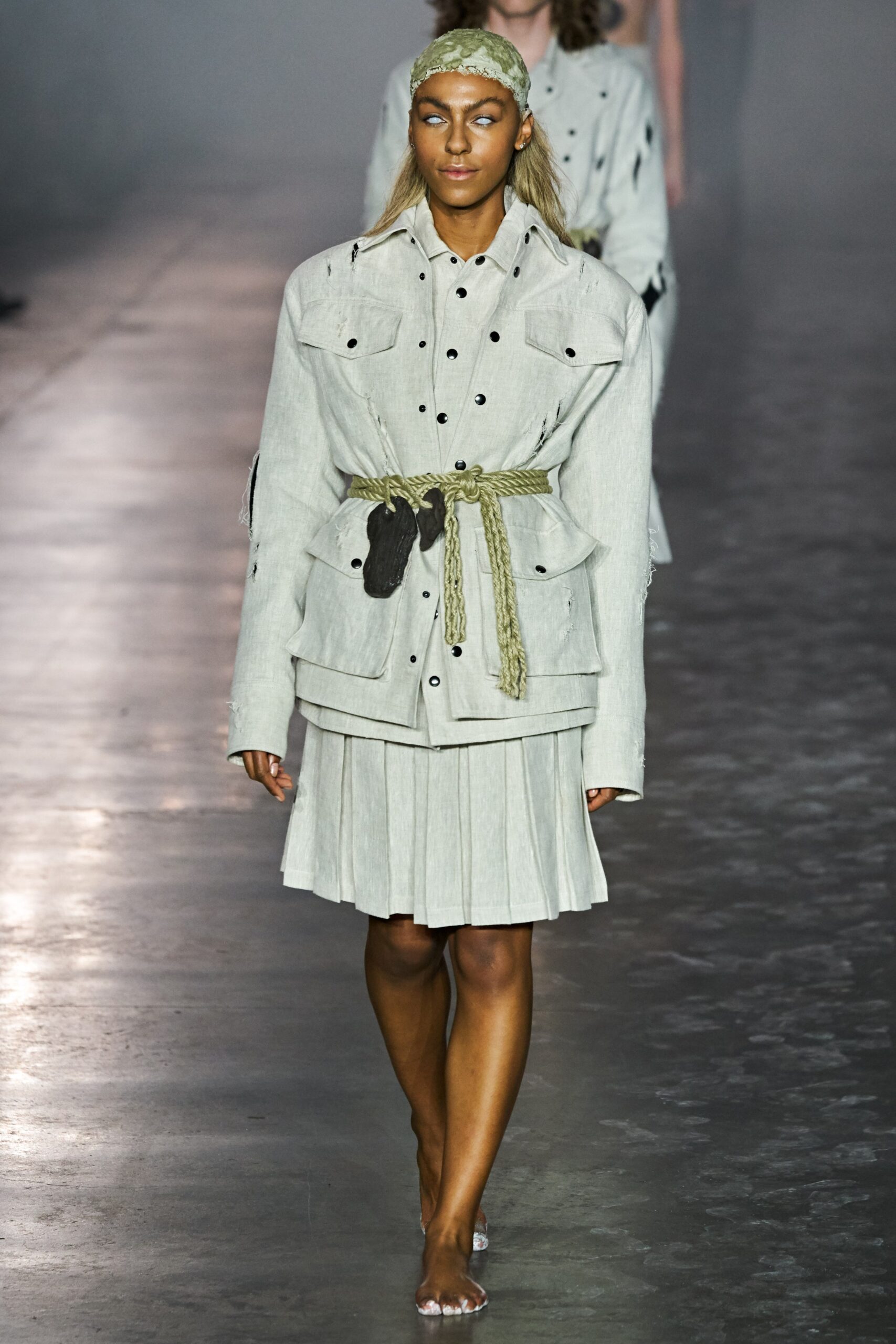 beige oversized jacket and mini skirt