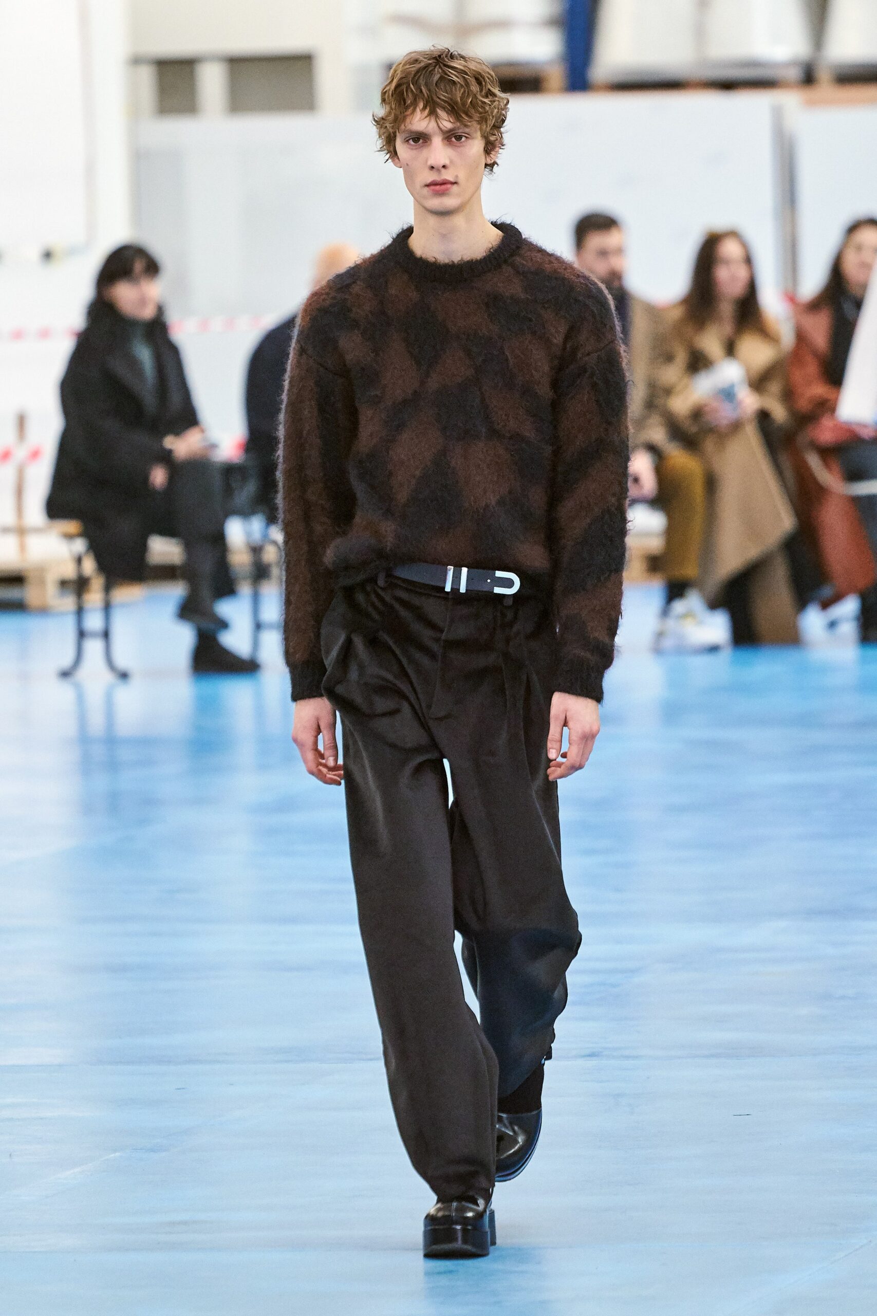 brown and black checked sweater with relaxed pants