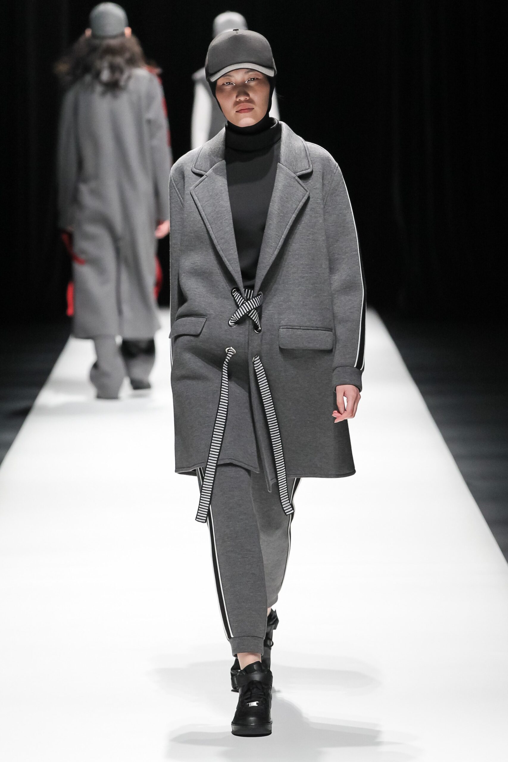 gray wool coat with black top