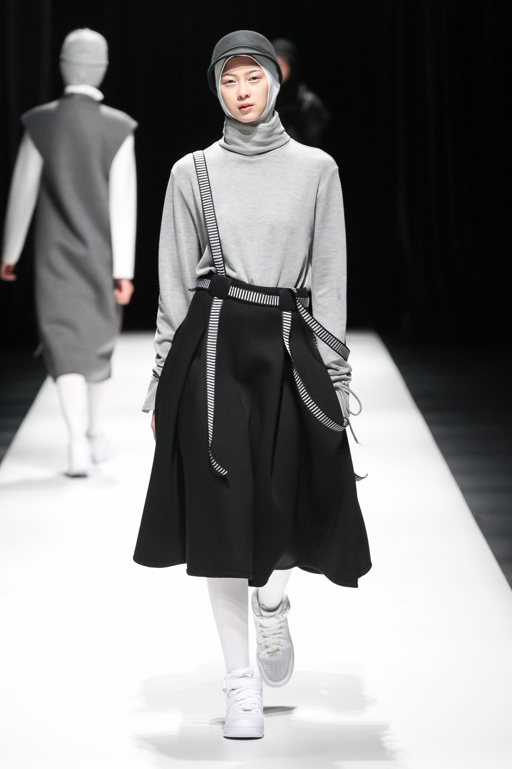 gray relaxed top black midi skirt