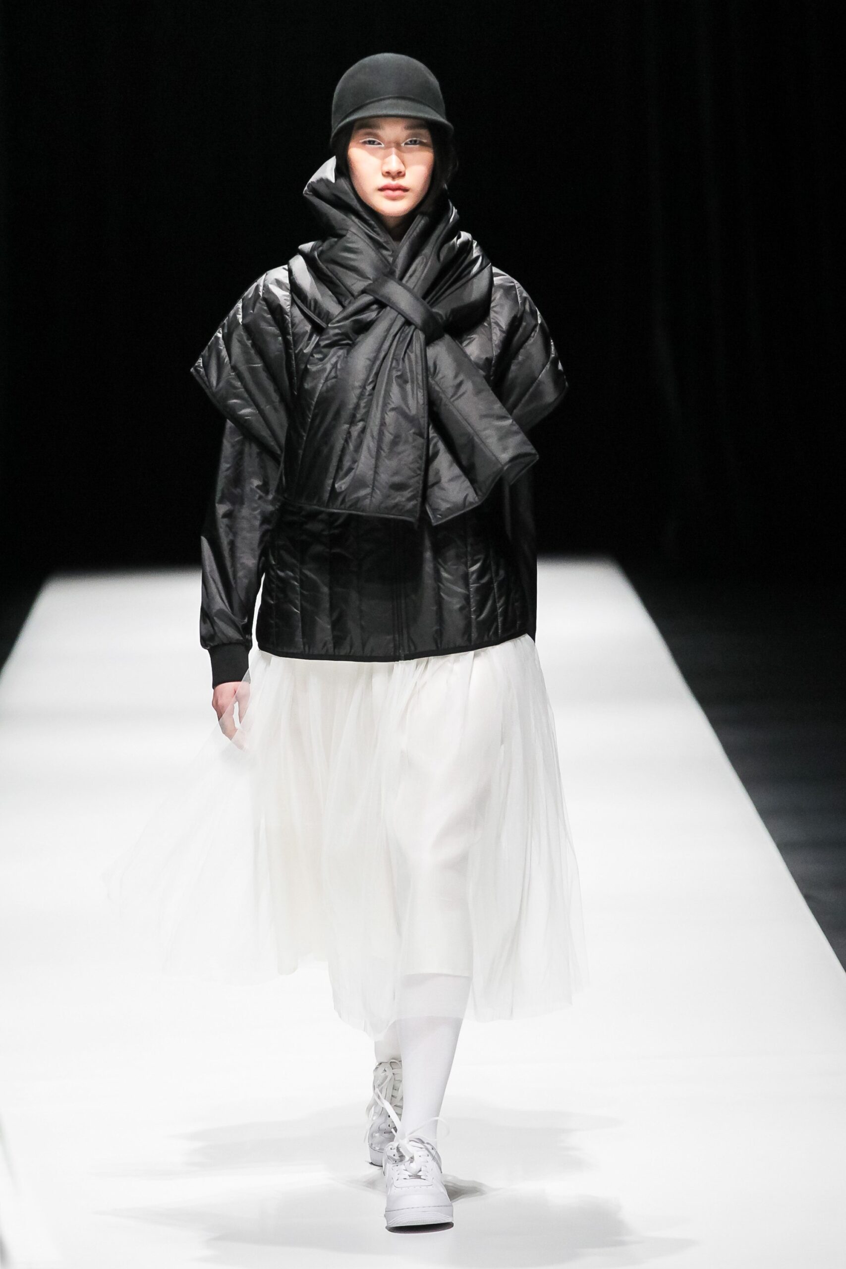 black vinyl jacket with white tulle skirt