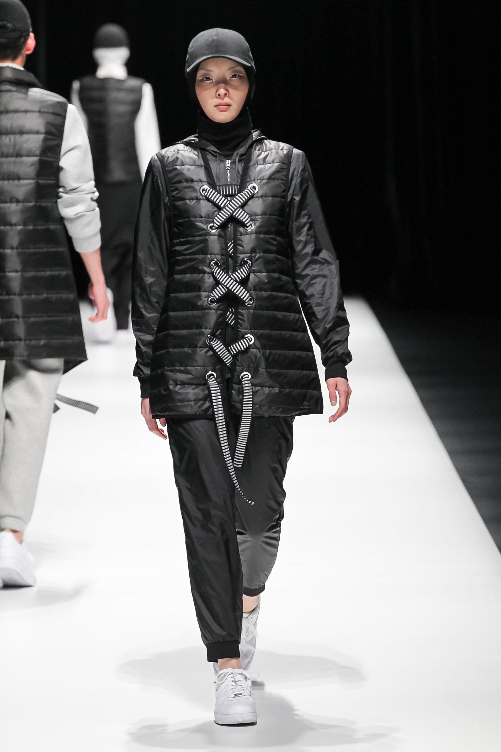 black relaxed jacket and gray pants