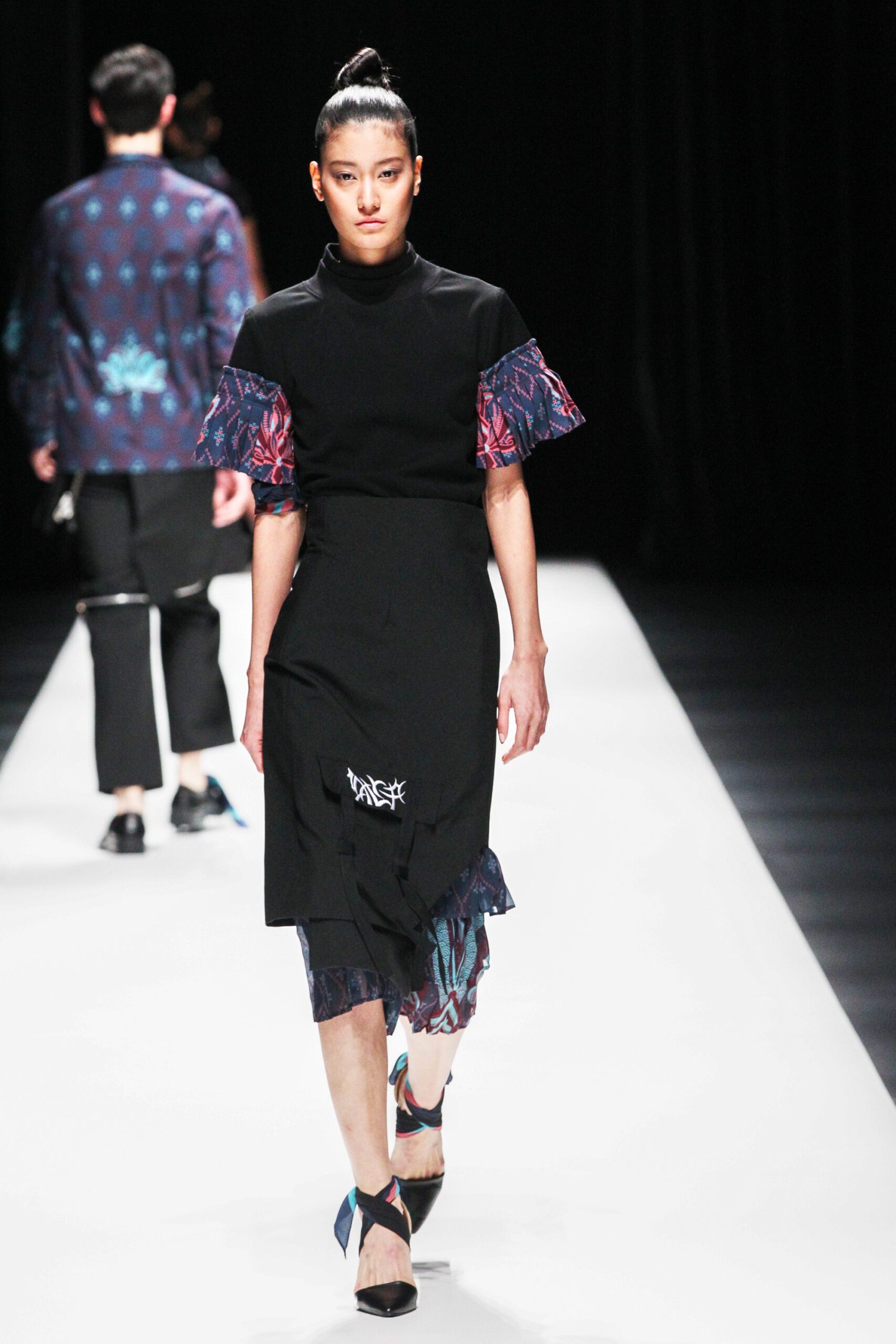 black fitted top and skirt