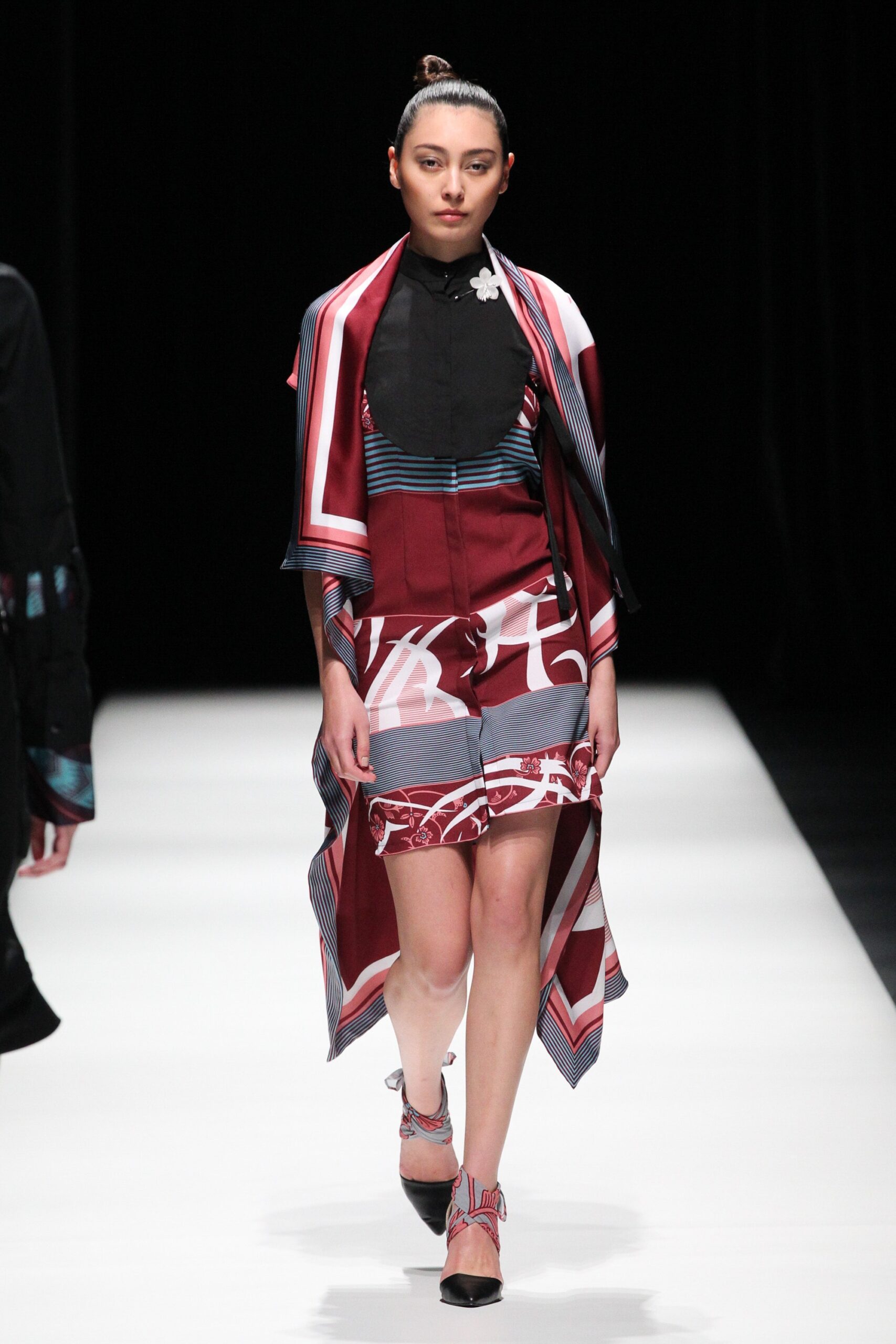 black fitted top with printed shorts