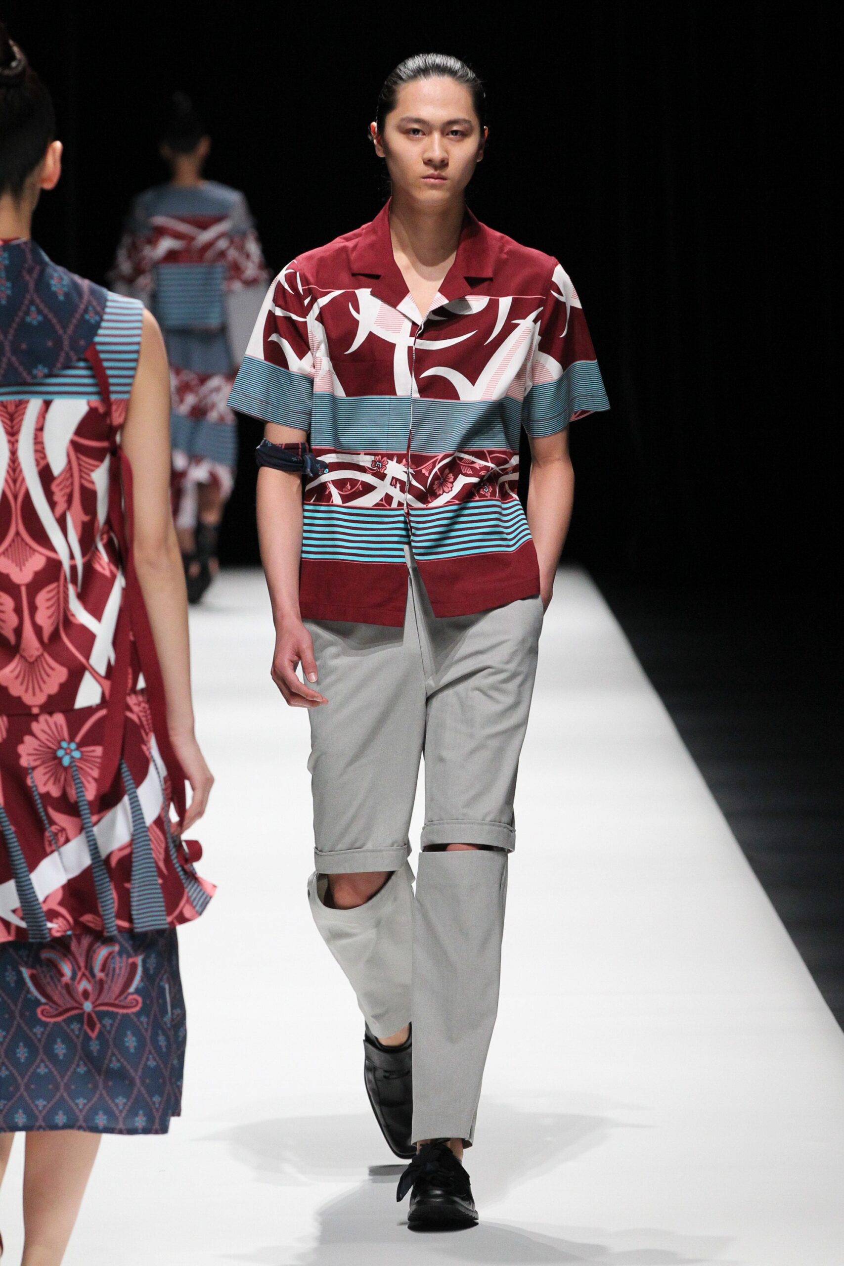 printed short-sleeve shirt and distressed pants
