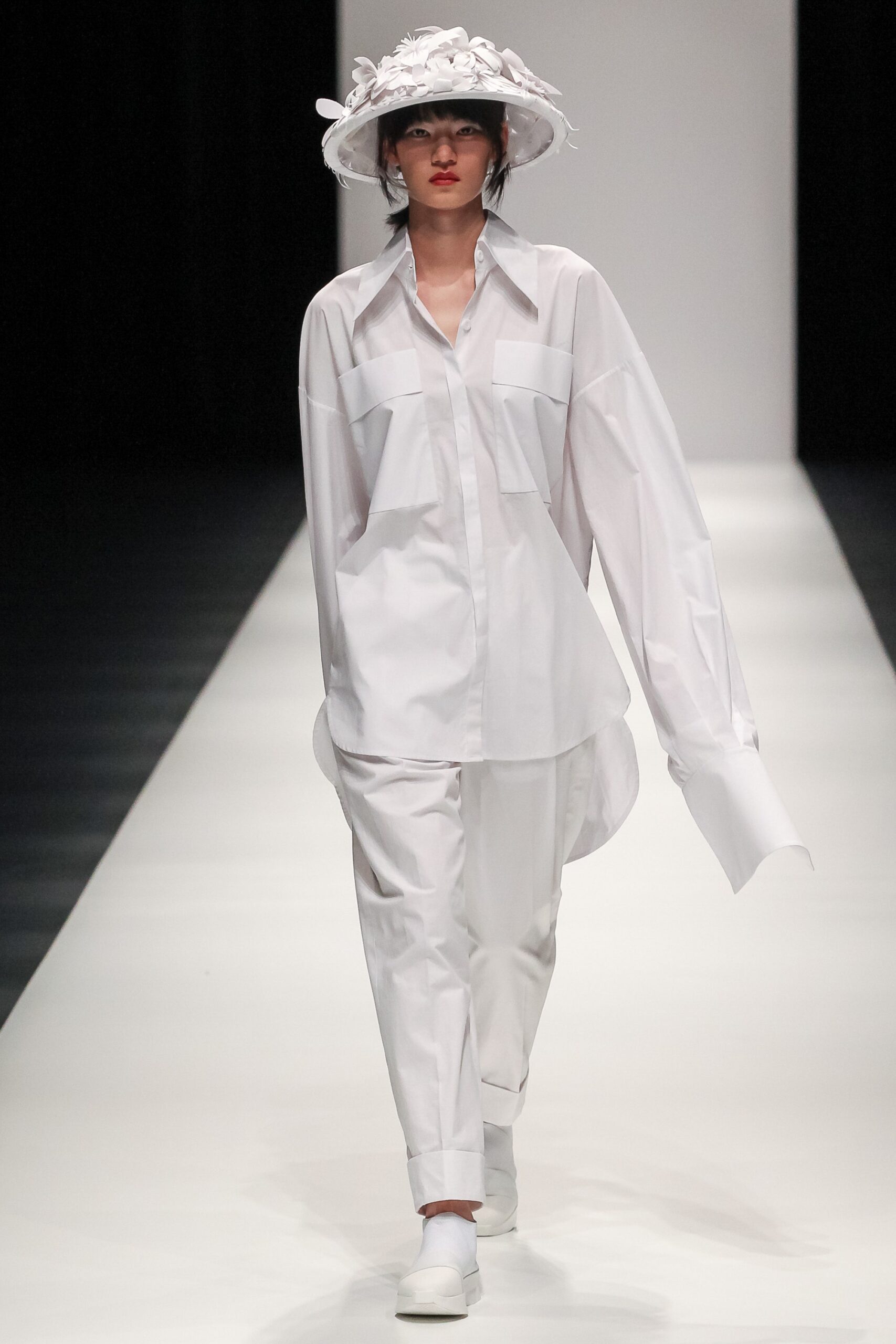 white relaxed shirt and pants