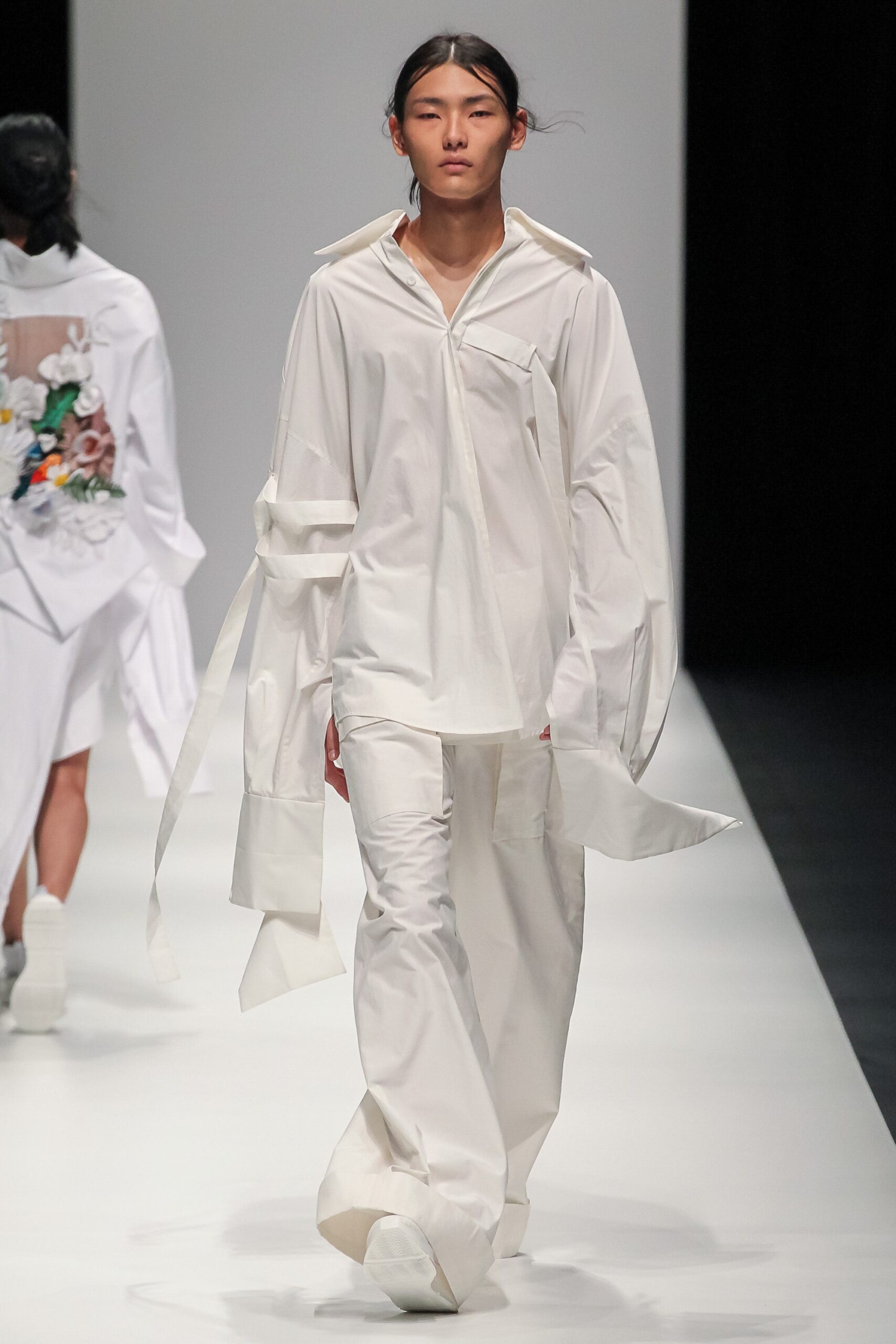 white relaxed shirt and pants
