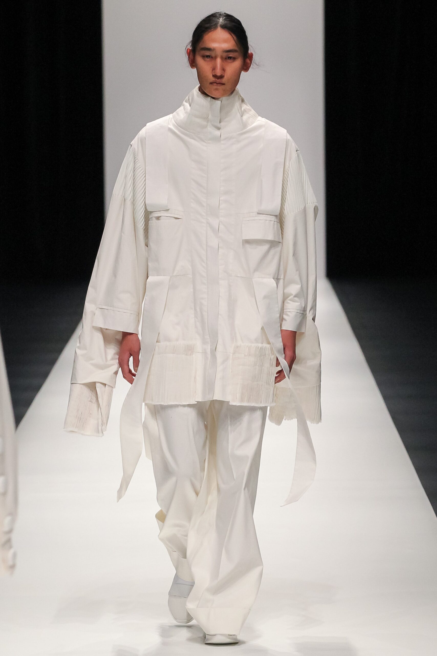 white oversized jacket and relaxed pants