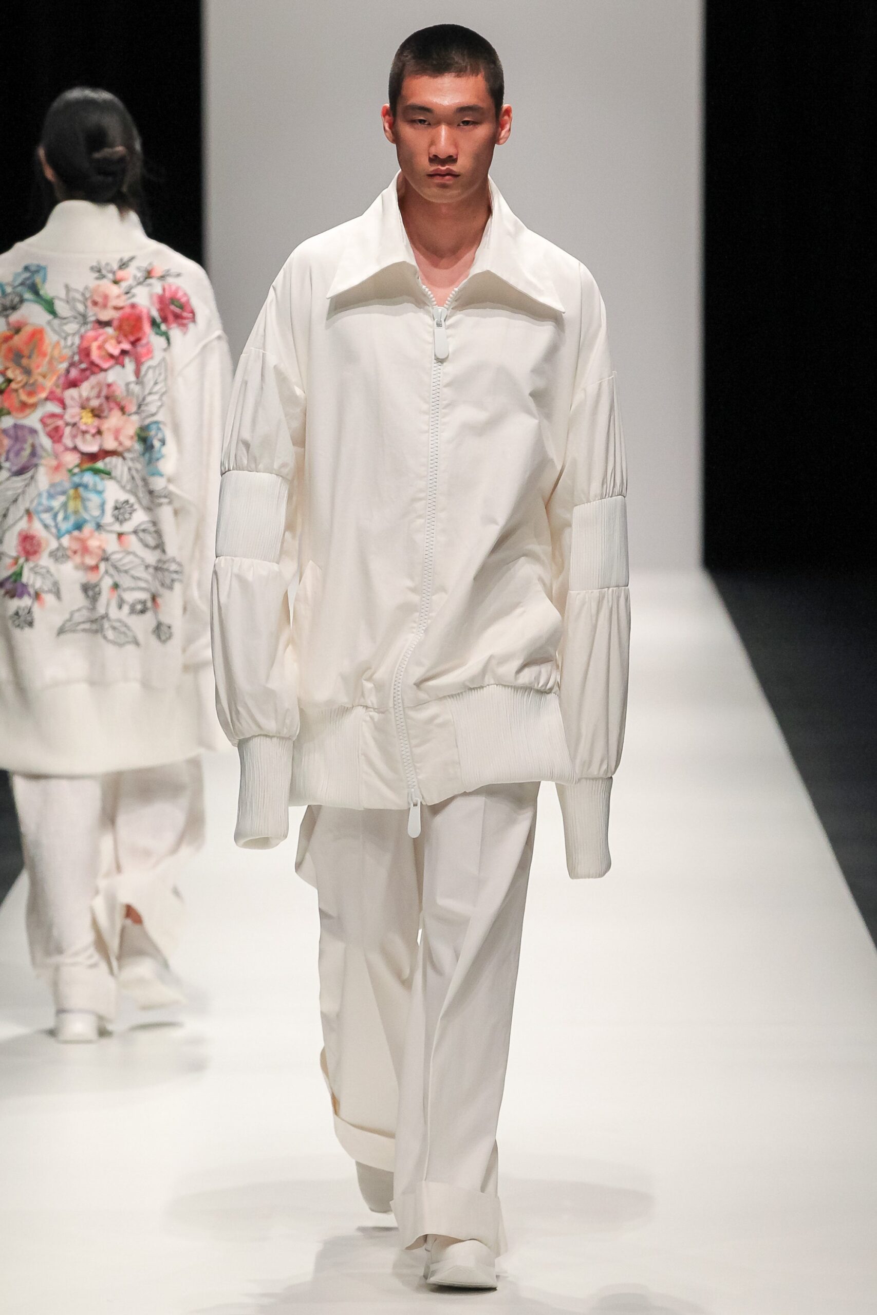 white oversized jacket and relaxed pants