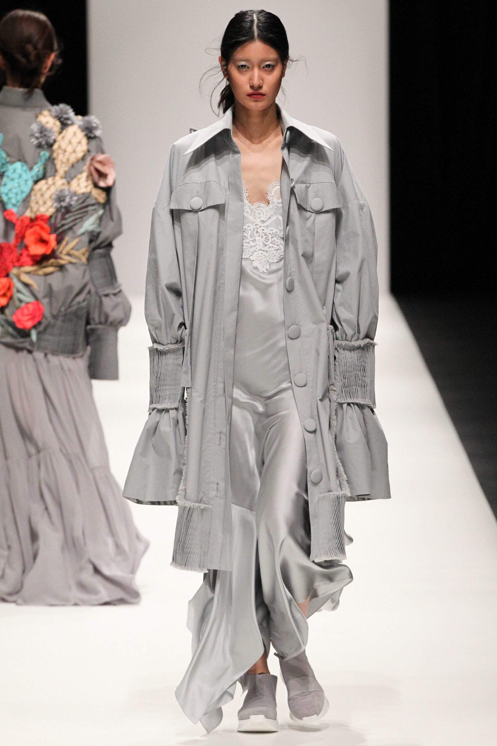 gray coat and silk dress