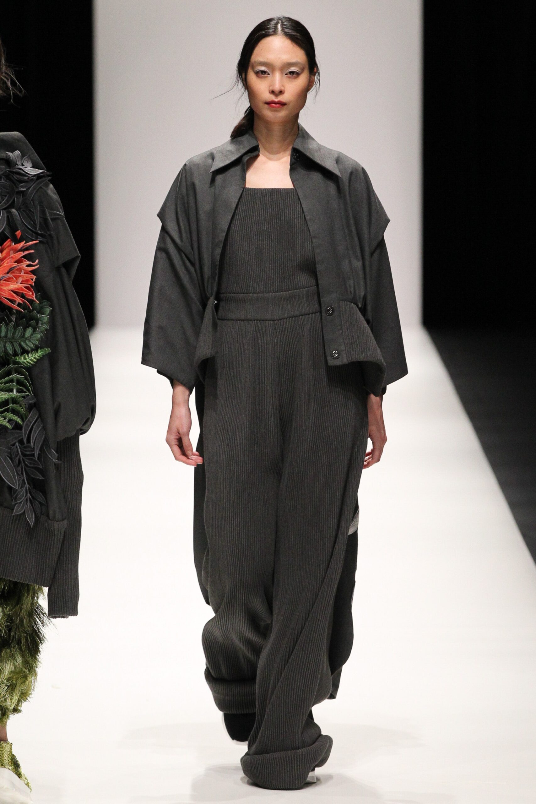 gray relaxed jacket and fitted jumpsuit
