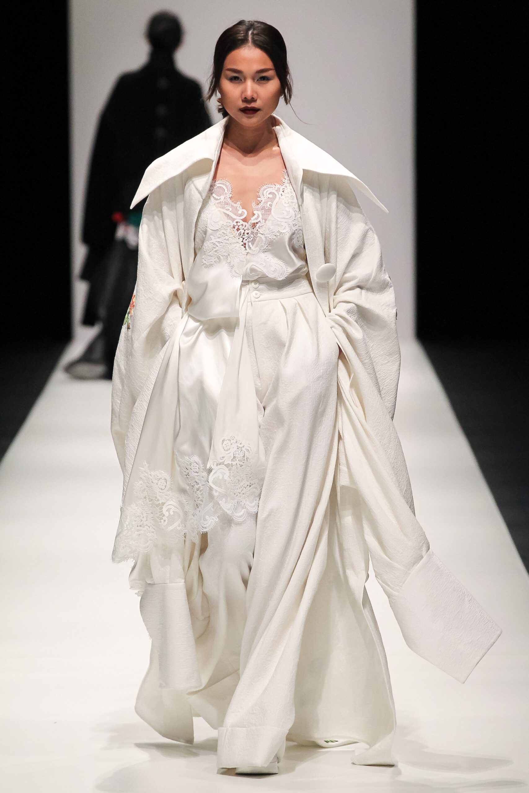 white silk gown with cape