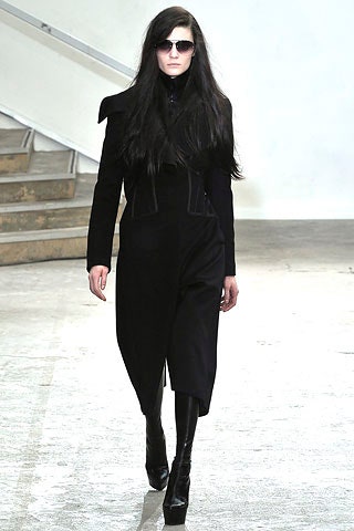 black fitted coat with sunglasses