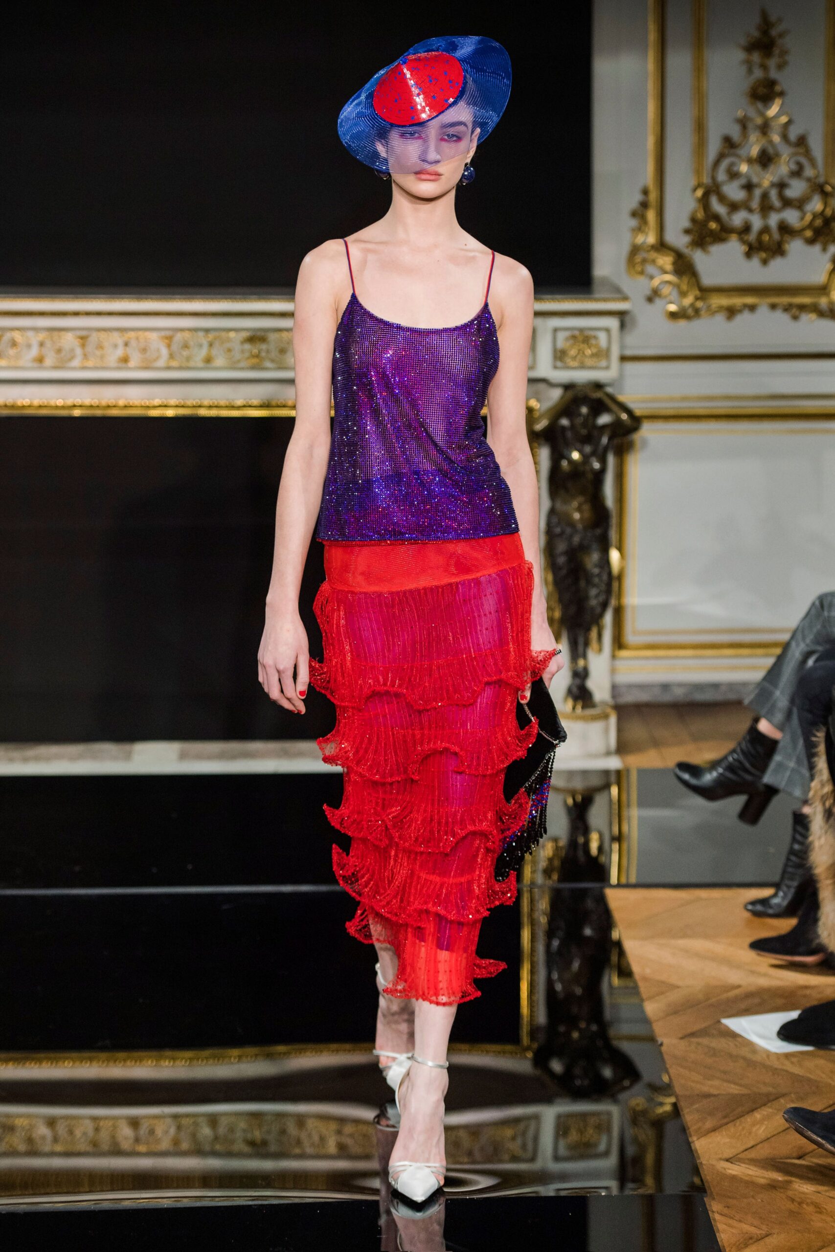 purple sequined top with red tiered skirt