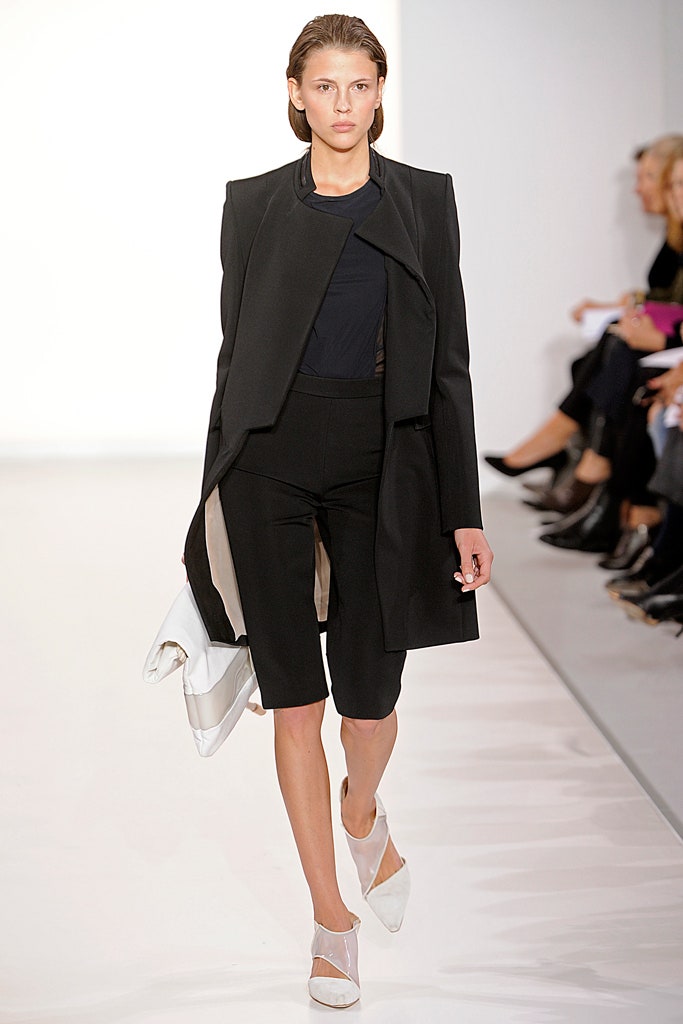 black wool long-sleeve collared fitted draped coat