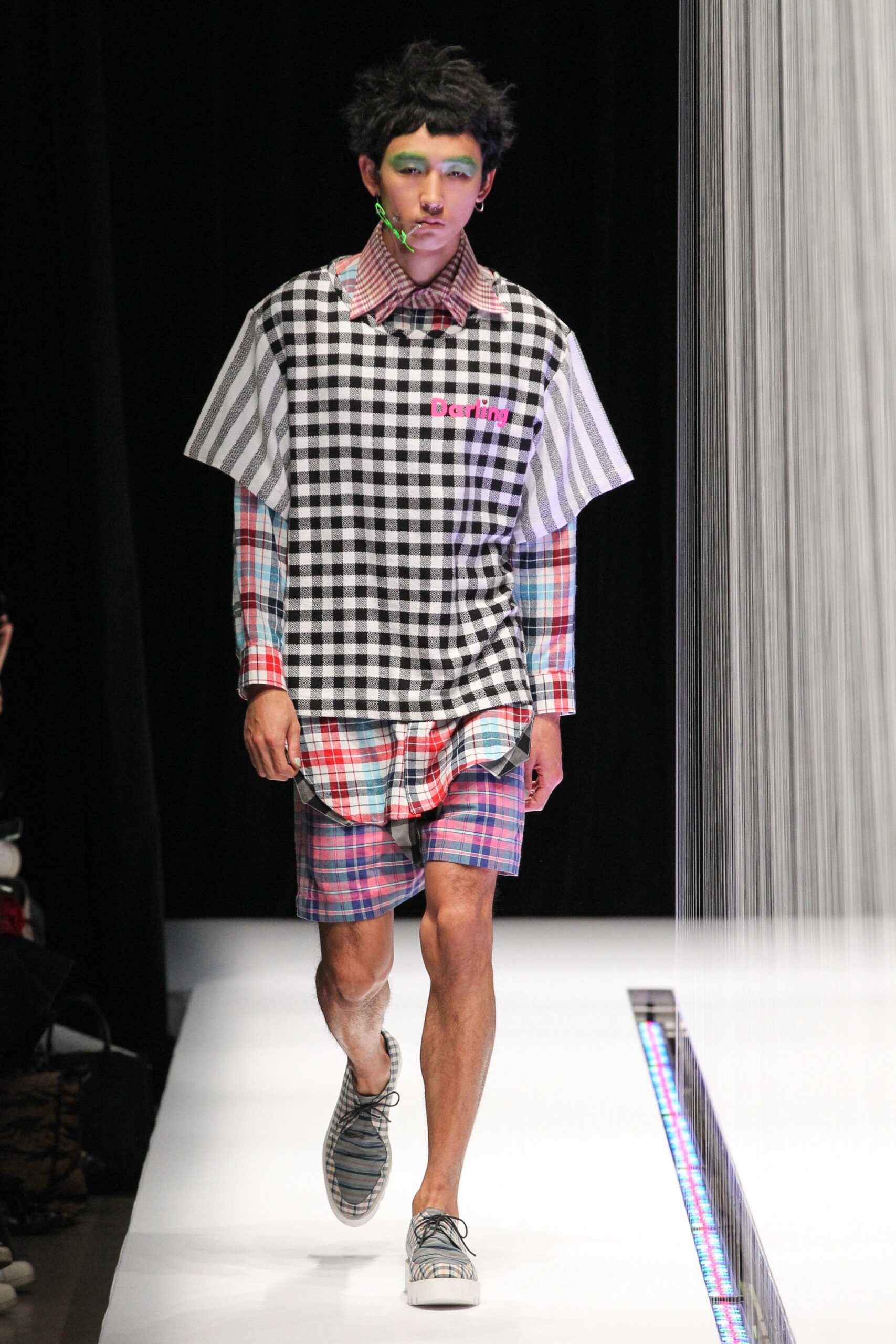 checked shirt and plaid shorts