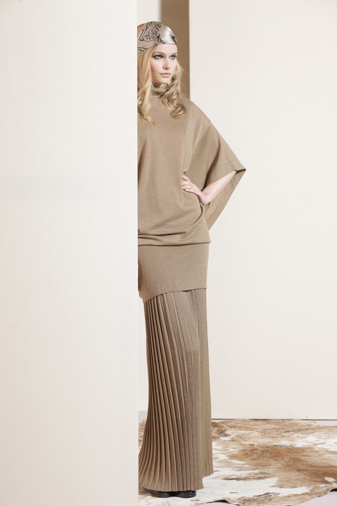 beige relaxed top with pleated skirt